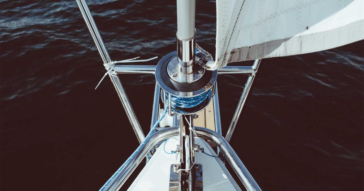 Ontario university graduate in cap and gown representing the OINP Masters Graduate Stream immigration pathway