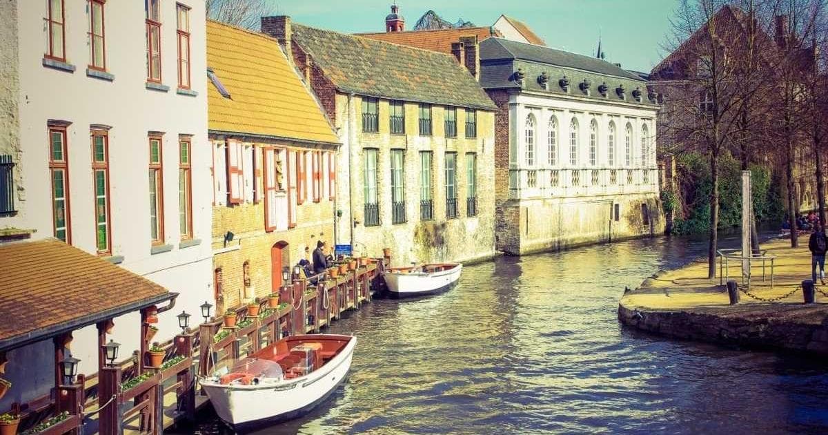 Diverse newcomer family enjoying a scenic rural Canadian landscape, symbolizing community integration.