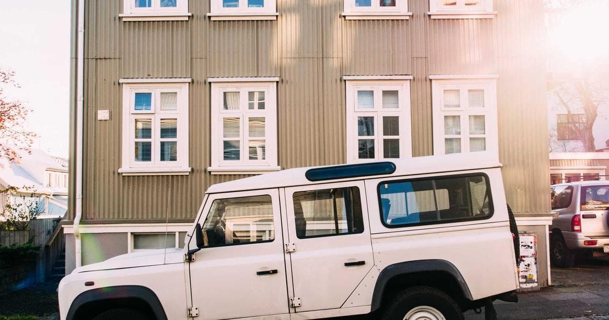University of Manitoba campus entrance with students walking in early spring