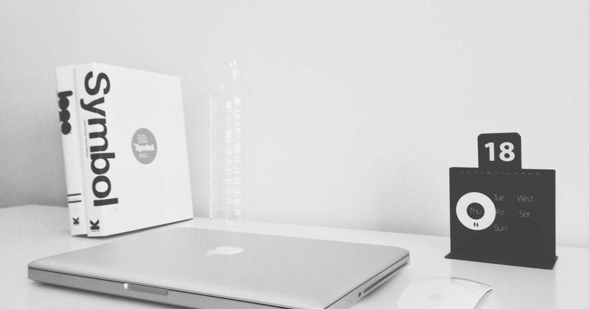 Diverse newcomers actively participating in a free English or French language class in Canada.