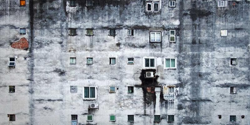 Business documents and passport laid out for a work permit application