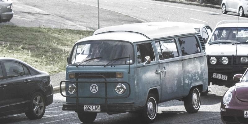 Canadian flag with travel documents and passport on a table