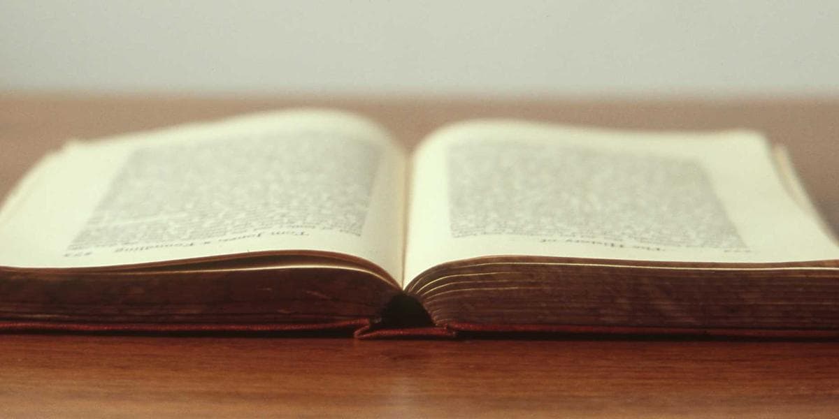 Two passports, one Canadian and one from another country, illustrating Canadian dual citizenship rules.