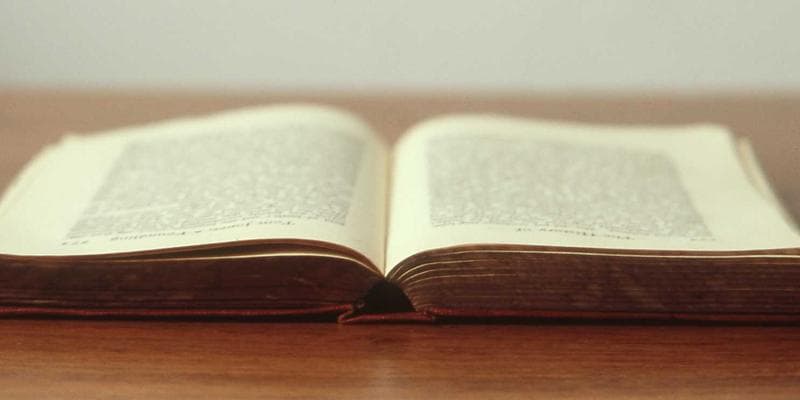 International student graduating from a Quebec university in cap and gown