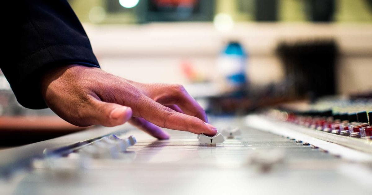 A multi-generational family gathered together at a dining table in a Canadian home