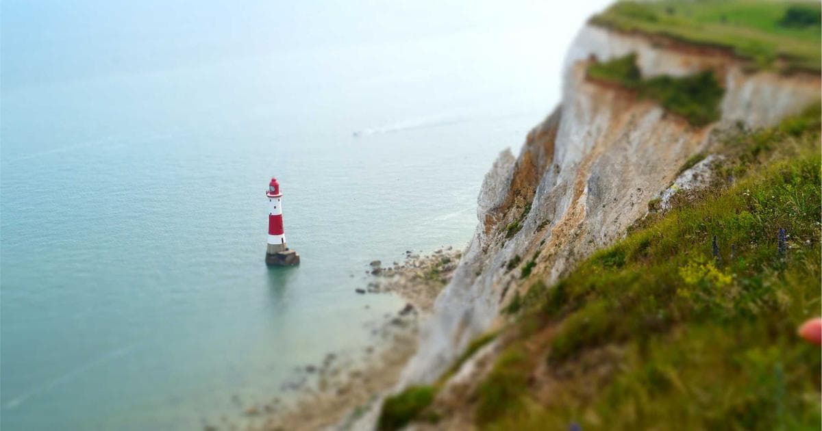 A young person exploring a vibrant Canadian city street with shops and restaurants