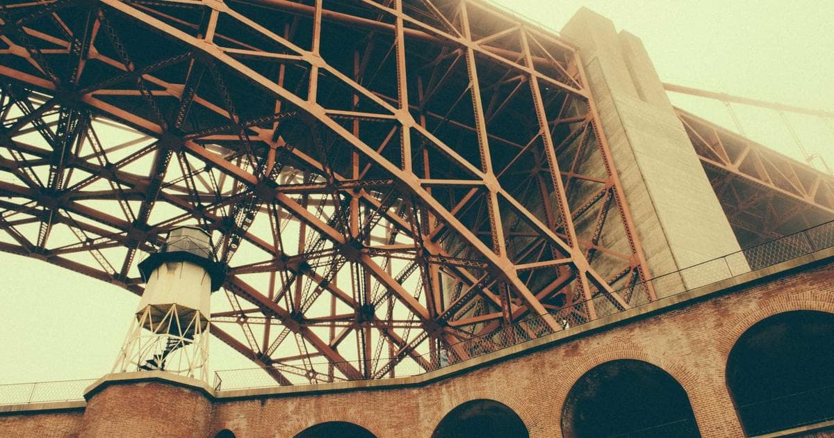 Canadian family celebrating purchase of their first home with keys in hand