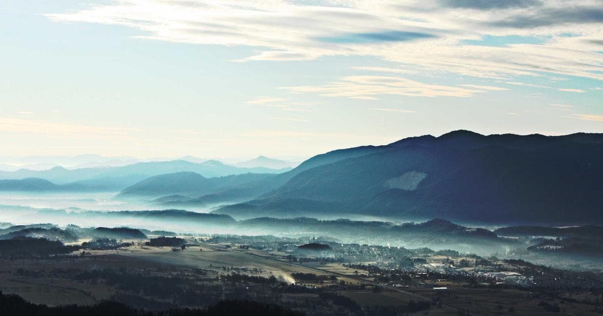 Newcomer reviewing Canadian Experience Class immigration documents at a desk in Canada