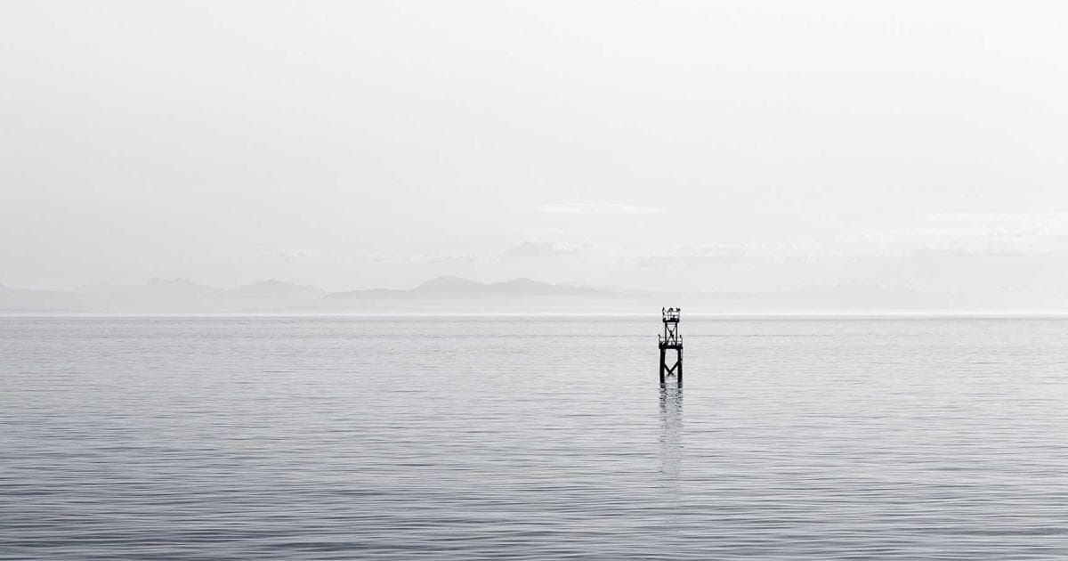 Canadian senior reviewing Guaranteed Income Supplement benefit documents and payment information