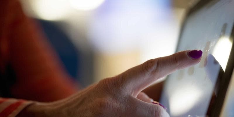 Beautiful exterior of a diverse place of worship in a Canadian city with people entering