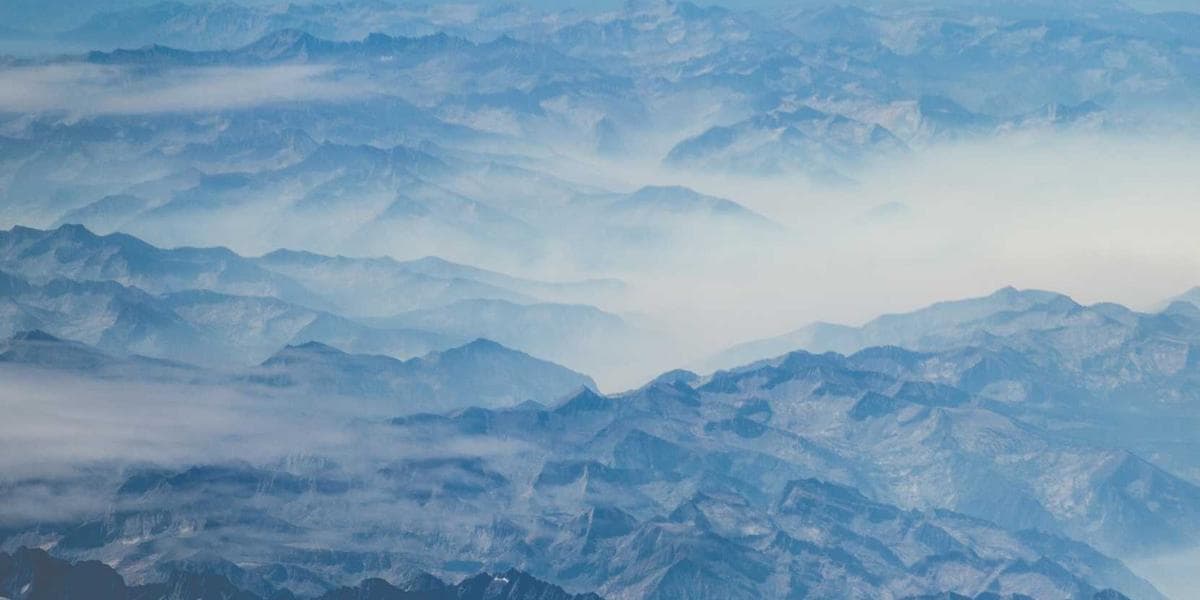Foreign-trained doctor consulting with a patient in a Canadian hospital setting
