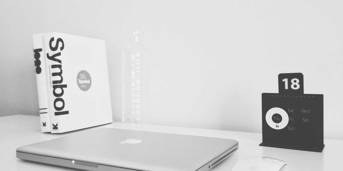 Senior business manager leading a strategy meeting in a modern Canadian corporate office