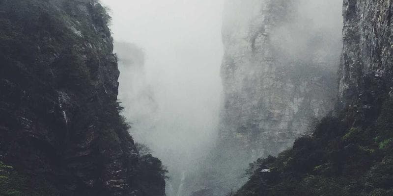 Aviation inspector reviewing aircraft safety documentation at a Canadian maintenance facility