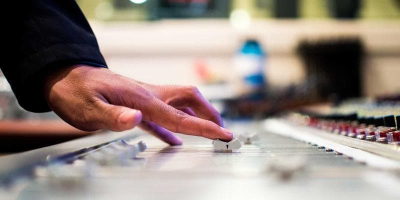 Children doing arts and crafts at an Ontario community summer camp program