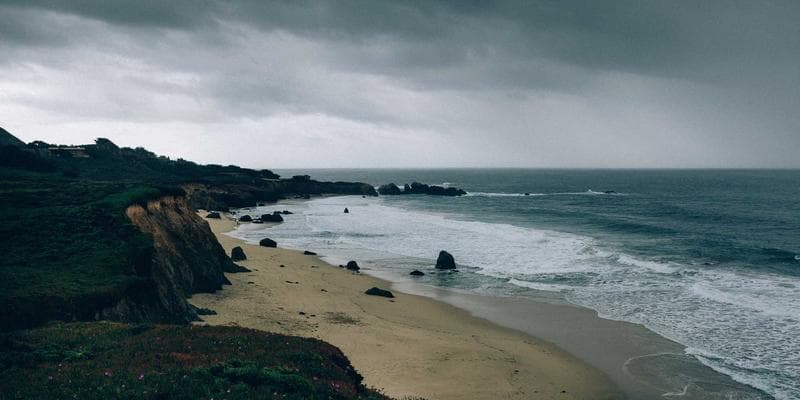 Person using a laptop to update personal information online, representing CRA My Account