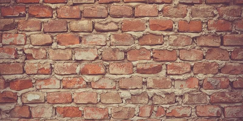 Diverse group of people discussing housing options with a settlement worker