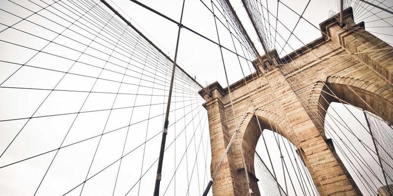 Diverse group of newcomers attending a financial literacy workshop in Quebec