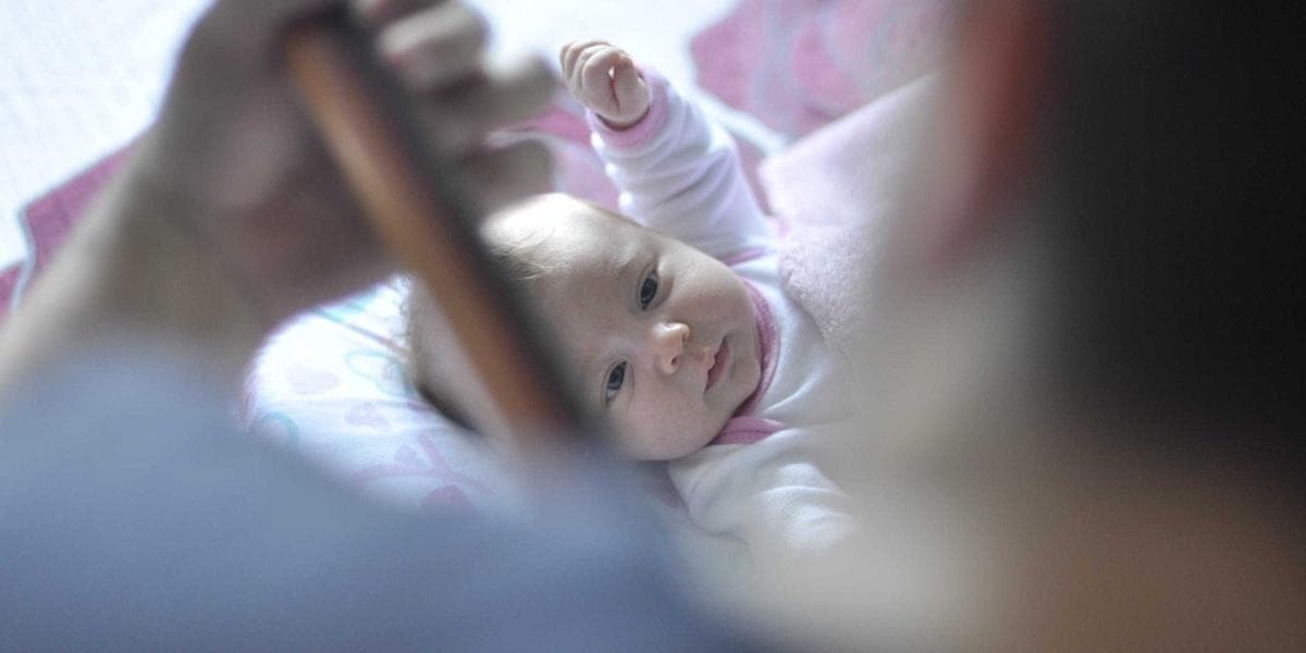 Couple reviewing spousal sponsorship application documents together in Canadian home