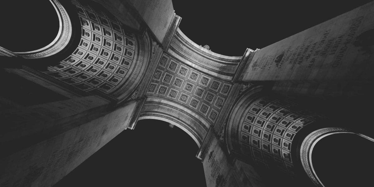 Newcomer family dressed in winter clothing enjoying snowy Canadian landscape