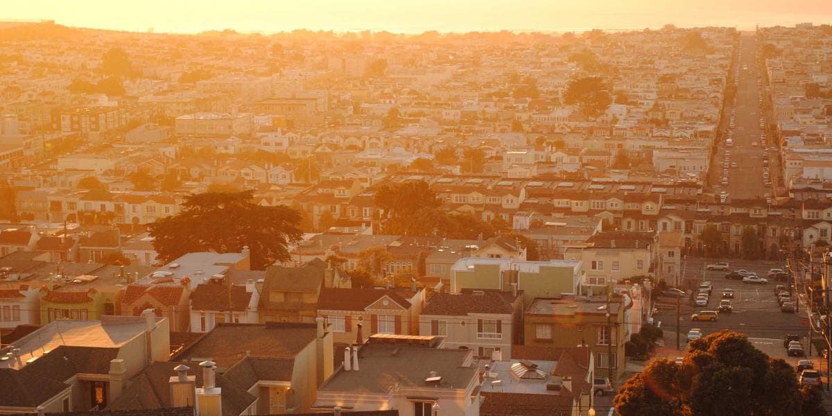 Newcomer checking credit score on computer screen showing credit report details