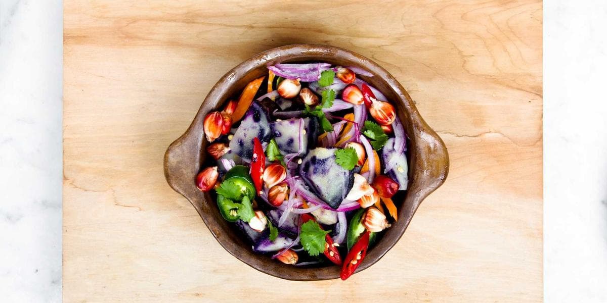 Two passports representing dual citizenship concept for Canadian newcomers