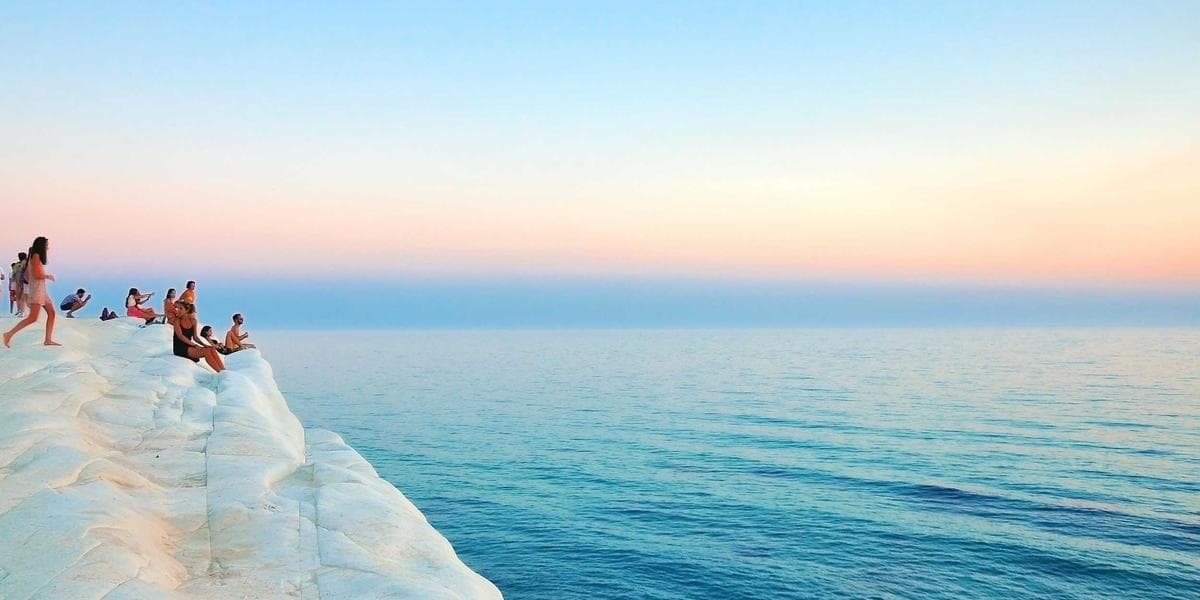 Caregiver helping elderly person in a Canadian home setting