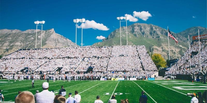 Meat processing facility workers in a Canadian plant wearing safety equipment
