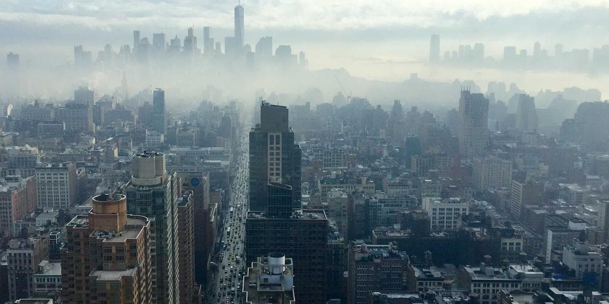 Official documents with stamps and seals on a wooden desk