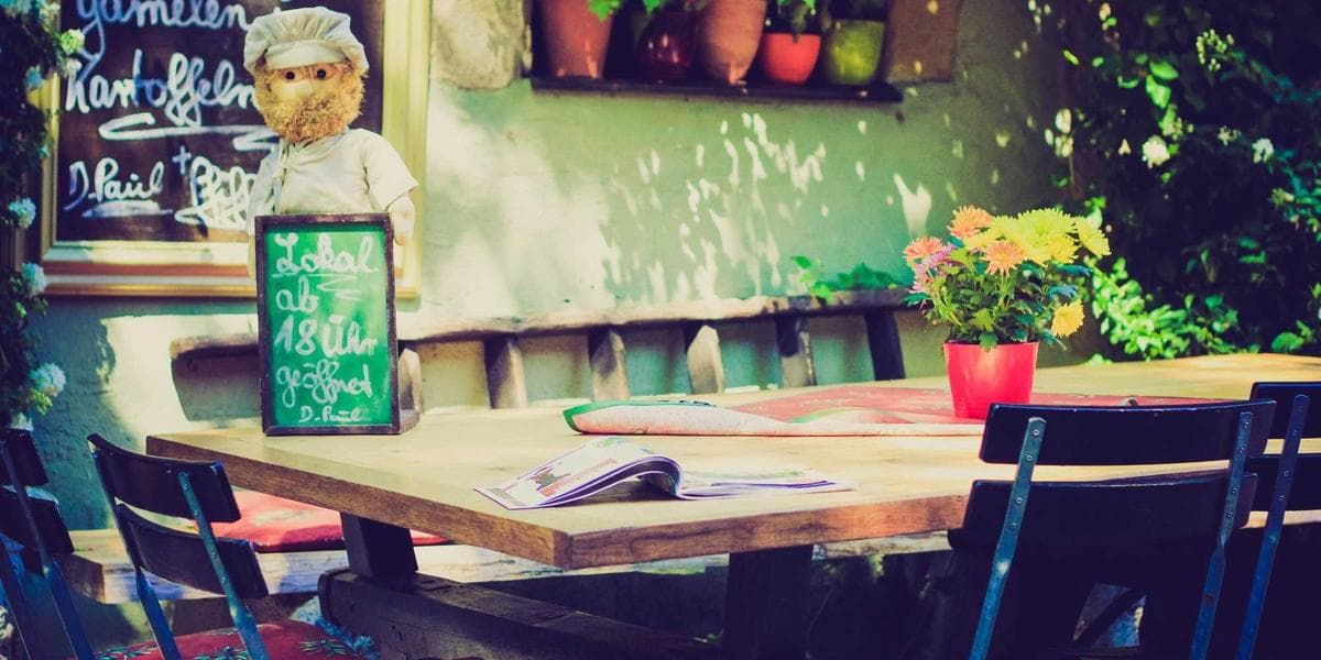 Young family with parents and children smiling in a Canadian park