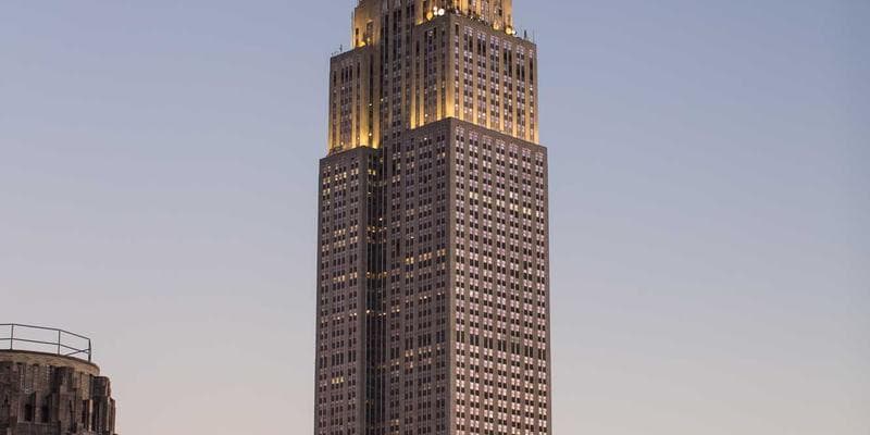 Calculator and financial documents for payroll tax calculation