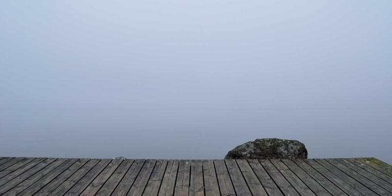 Person carefully filling out immigration paperwork