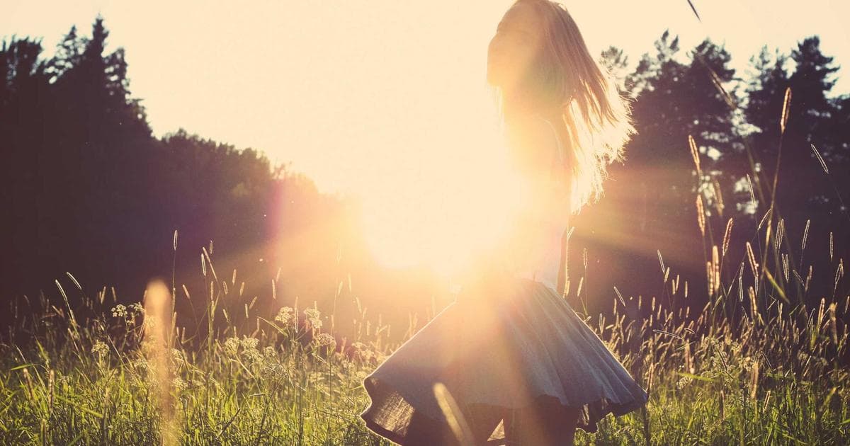 Canadian currency and a calculator on a table representing financial benefits