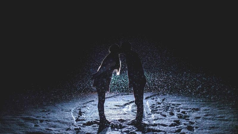 Non-profit board meeting around a table reviewing financial documents and annual reports