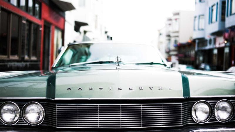 Newcomer family reviewing TD1 tax form with payroll documents