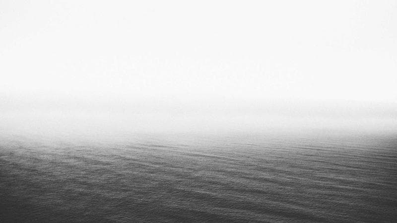 Calculator and paycheque showing tax deduction differences based on TD1 credits