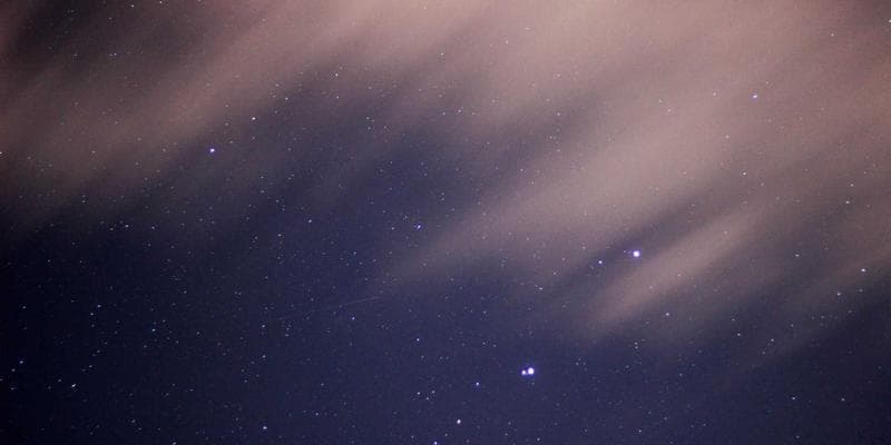 Canadian immigration documents including passport stamps and visitor record