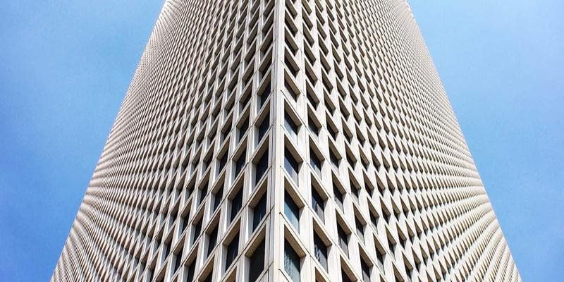 Parent meeting with teachers to discuss their child