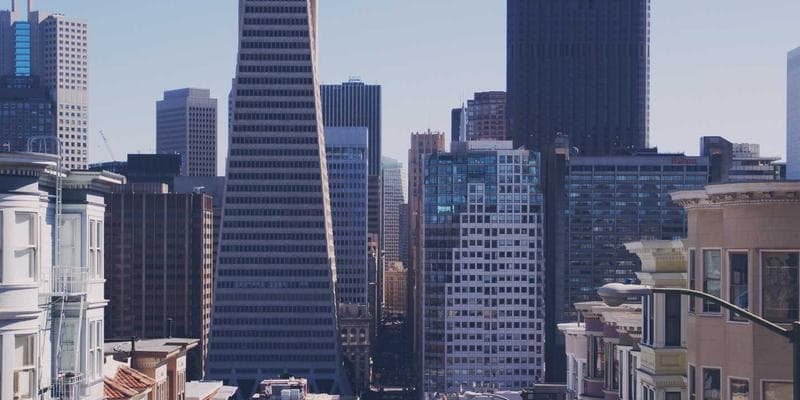 Small business storefront with insurance certificate displayed in the window