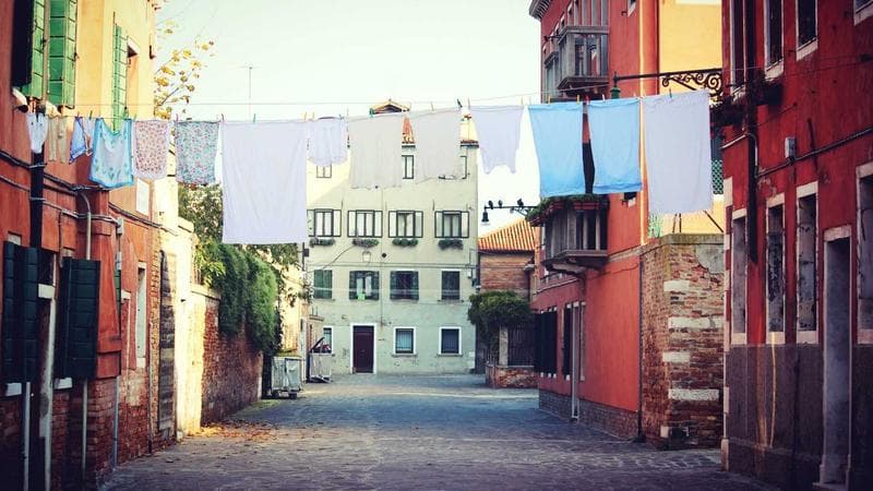 Aerial view of a charming rural Canadian community surrounded by forests and farmland