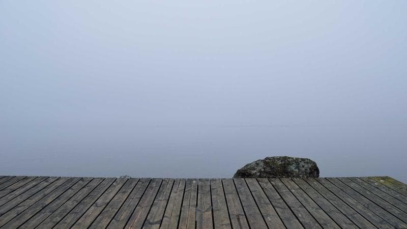 Skyline of a Canadian tech hub city with modern office buildings at sunset