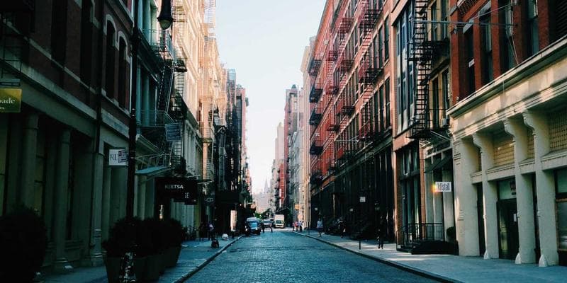 Team of cybersecurity analysts collaborating on threat analysis in a Canadian tech company