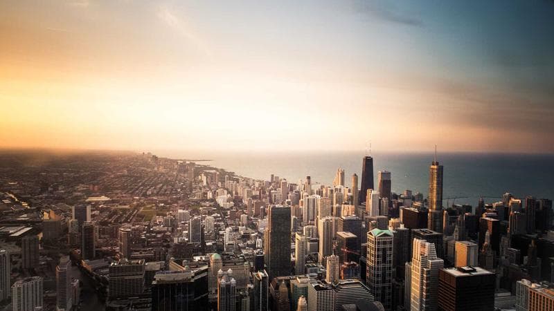 Newcomer professionals networking at a Canadian industry event