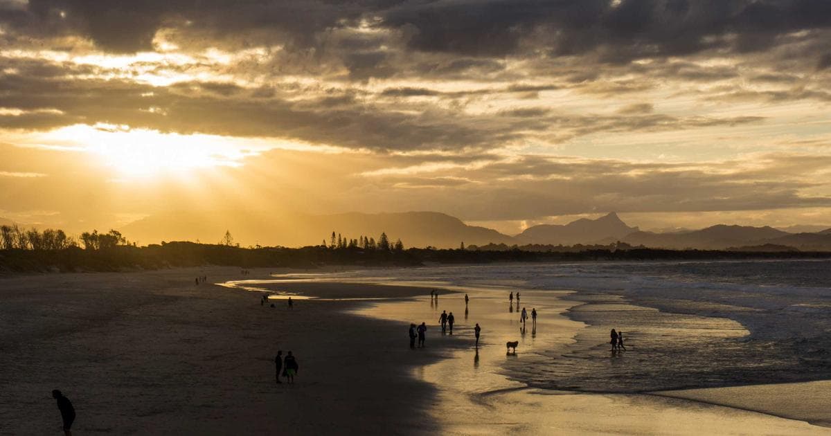 Diverse refugee family being warmly welcomed by Canadian sponsors, symbolizing resettlement and new beginnings in Canada