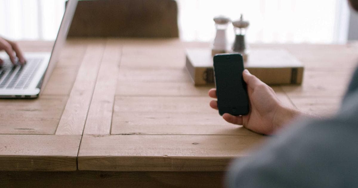 A multi-generational family smiling together in Canada, representing the Super Visa for parents and grandparents.