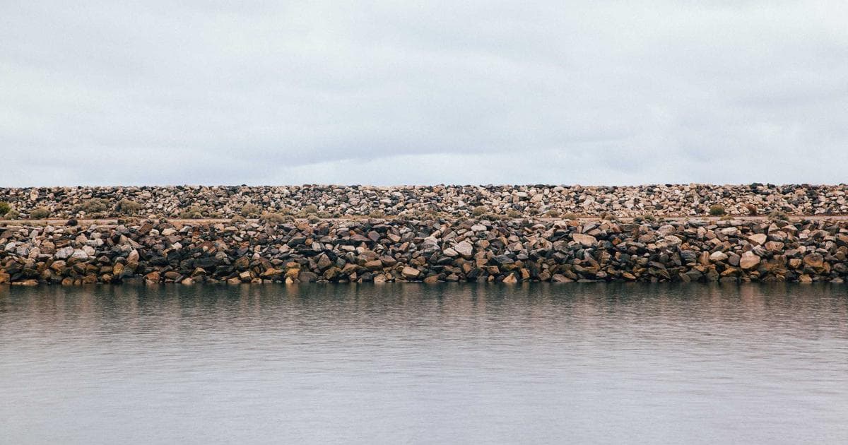 A Canadian work permit document, illustrating the differences between open and employer-specific permits and LMIA.