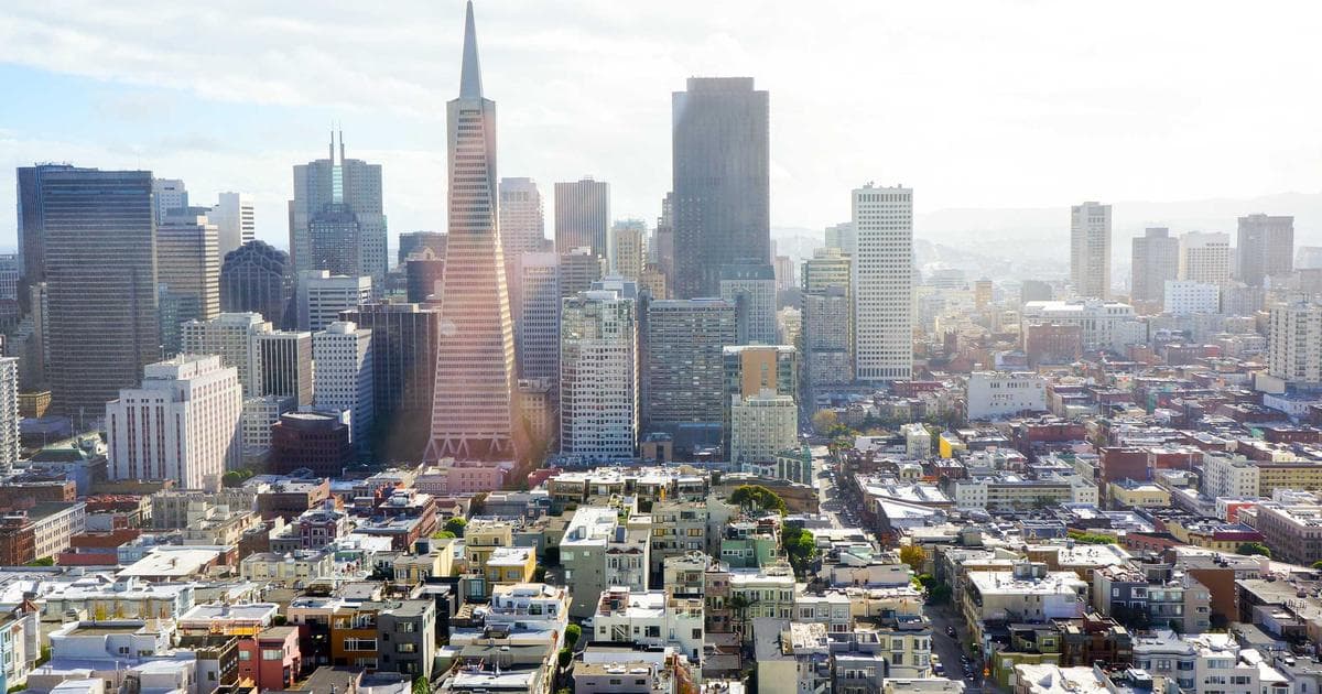Person working on a laptop filling out a government benefits application
