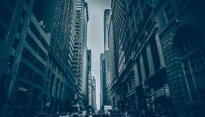 Person picking up a package at a Canada Post office counter