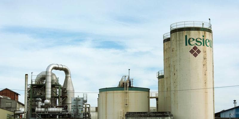 Person using mobile banking app on smartphone at TD Bank branch