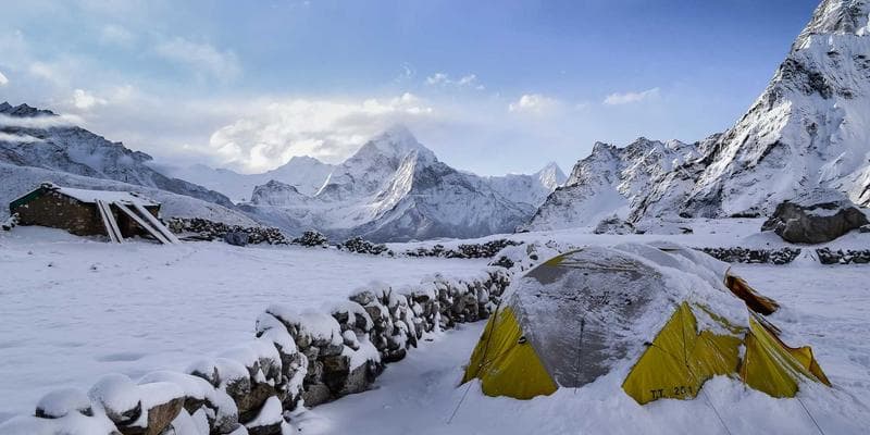 Mobile phone showing credit score improvement chart from 600 to 750