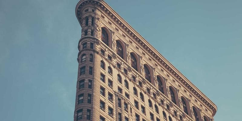 Canadian tax documents spread on a table with a pen and coffee cup